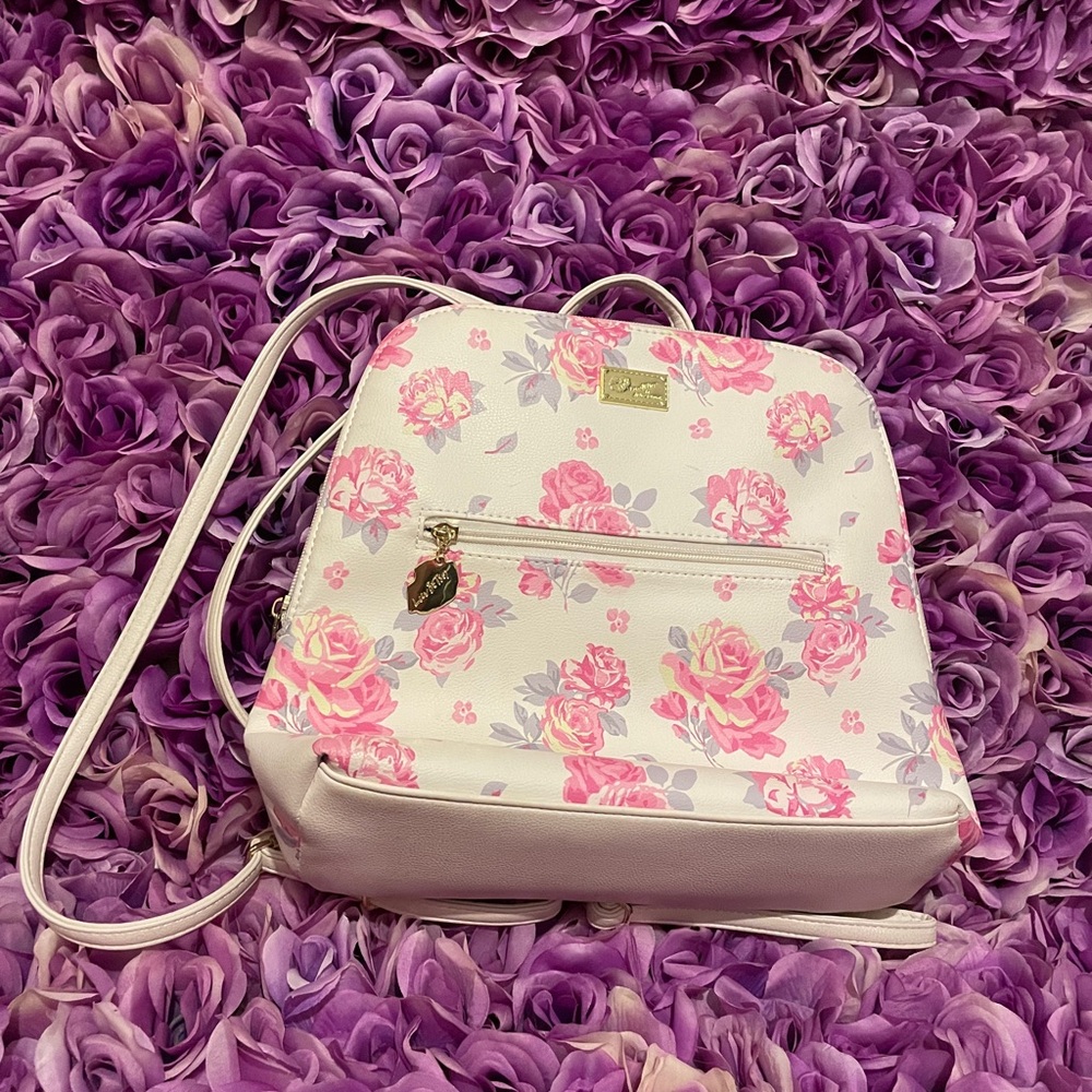 Betsey Johnson Backpack rose with white background.